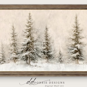 May include: A framed painting of a snowy winter scene with evergreen trees. The artwork has a muted colour palette and a soft, textured appearance. The frame is a warm, neutral brown.