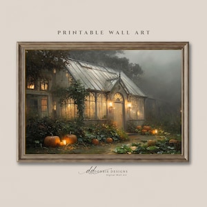 May include: A framed digital wall art print titled PRINTABLE WALL ART featuring a glass greenhouse in a misty garden at dusk. The structure is illuminated by warm interior lights, surrounded by orange pumpkins and lush greenery in the foreground.