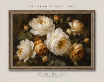 May include: A framed wall art print featuring a dark, moody floral arrangement of cream, white, and golden-brown roses with green leaves. The text PRINTABLE WALL ART appears above the frame, and DOBBIE DESIGNS Curated Wall Decor appears below.
