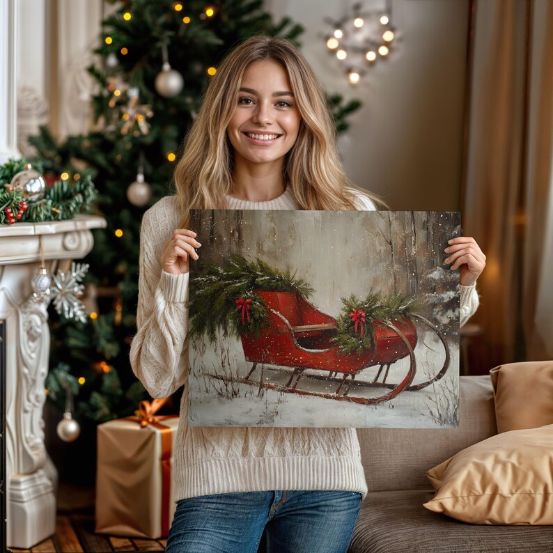 May include: A canvas print featuring a red sleigh decorated with evergreen boughs and red bows, set against a snowy forest backdrop. The artwork evokes a winter holiday theme, perfect for seasonal decor.