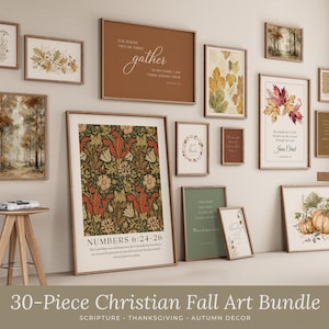 May include: A collection of framed wall art prints featuring autumn-themed illustrations, botanical patterns, and religious scripture text. The set includes various sizes with earthy color palettes of orange, green, and brown, displayed on a wall.