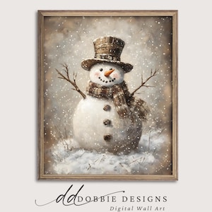 May include: A framed digital wall art print featuring a snowman. The snowman has a top hat, scarf, and twig arms. The artwork is in a vintage style with a snowy background. The text "DOBBIE DESIGNS Digital Wall Art" is at the bottom.