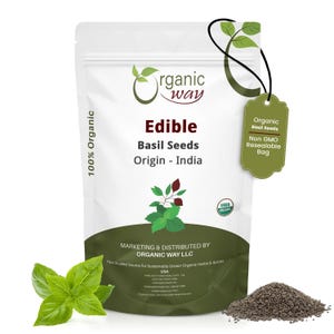 May include: A white resealable pouch of Organic Way edible basil seeds from India. The packaging features the Organic Way logo, green basil leaf graphics, and a green tag stating Organic Basil Seeds and Non GMO Resealable Bag. A pile of seeds and fresh basil leaves are visible.