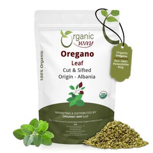 May include: A white resealable pouch of Organic Way Oregano Leaf, cut and sifted, originating from Albania. The packaging features green text and graphics, a USDA Organic seal, and a hanging tag. Fresh green oregano leaves and dried herbs sit below.