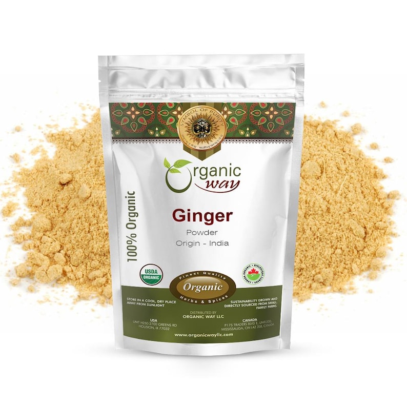 May include: A white resealable pouch with a silver background containing organic ginger powder. The pouch has a label with the text "Organic Way" and "Ginger Powder Origin - India". The pouch is sitting on a pile of ginger powder.