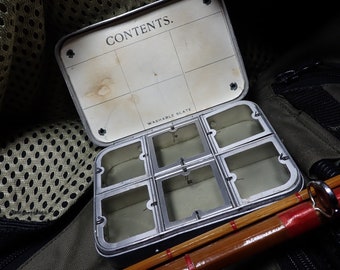 Wheatley vintage fly box, circa 1925, has 6 compartments with a washable slate, in very good usable condition, a unique fly fishing gift.