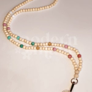 Cordino in silicone arcobaleno con perline di legno, porta badge, collana, regalo per il ritorno a scuola, chiusura di sicurezza. immagine 6
