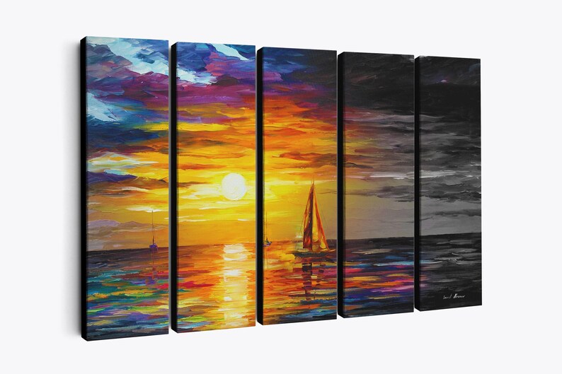 May include: A five-panel canvas art piece depicting a sunset over the ocean. The artwork features vibrant colors, including orange, yellow, blue, and purple, with sailboats and the sun. The last two panels are in grayscale.
