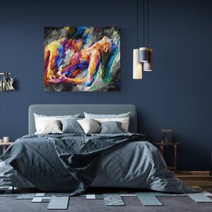 May include: A bedroom scene with a large abstract painting above a bed. The painting features figures in vibrant colors. The room has a blue color scheme, with a bed, side tables, and a chair. Decorative lighting hangs from the ceiling.