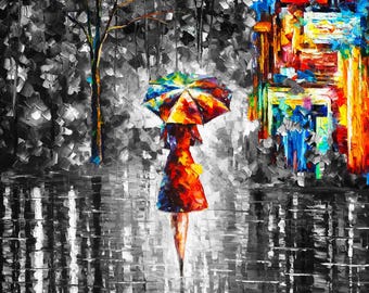 Peut inclure: Peinture impressionniste représentant une personne avec un parapluie coloré marchant sous la pluie. L'œuvre utilise une palette de couleurs vives sur un fond en niveaux de gris, avec un arbre et un bâtiment visibles.