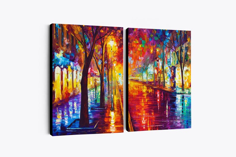 May include: Two-panel canvas art featuring a vibrant, impressionistic street scene. The artwork depicts a tree-lined street with colorful reflections on a wet surface, illuminated by streetlights. The color palette includes blues, yellows, and reds.