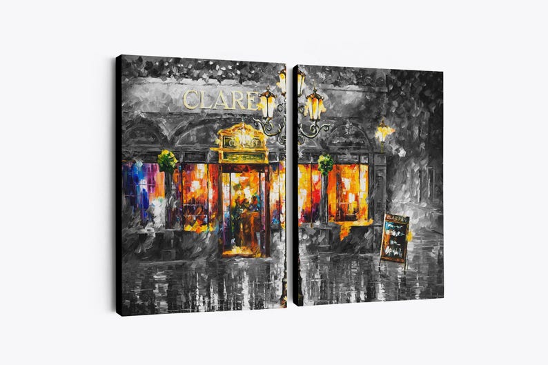 May include: A diptych canvas print of a street scene at night. The artwork depicts a building with the name "CLARE" in gold lettering above the entrance. The scene is primarily in grayscale with vibrant orange and yellow light emanating from the windows.