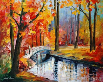May include: An impressionistic oil painting of an autumn landscape. A white bridge arches over a reflective river, with a figure walking across it. The trees are ablaze with red, orange, and yellow leaves, creating a vibrant and colorful scene.