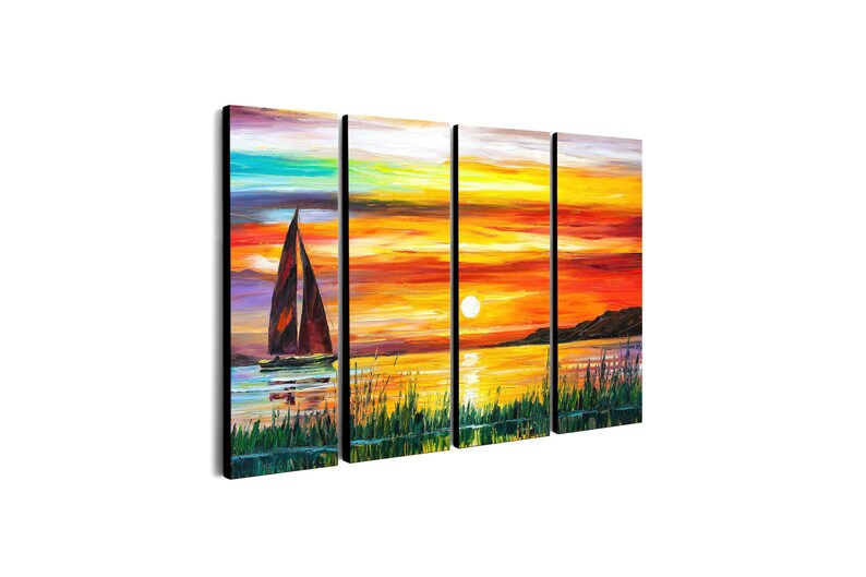 May include: A four-panel canvas art piece depicting a sunset over water. A sailboat with a dark sail is on the water. The sky transitions from blue to orange and yellow. Green reeds are in the foreground. The sun is a bright white circle.