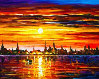 May include: An oil painting depicts a vibrant sunset over a city skyline. The sky is a blend of orange, yellow, and purple hues, with a bright sun. The city's silhouette is dark against the colorful sky, and the water reflects the sunset.