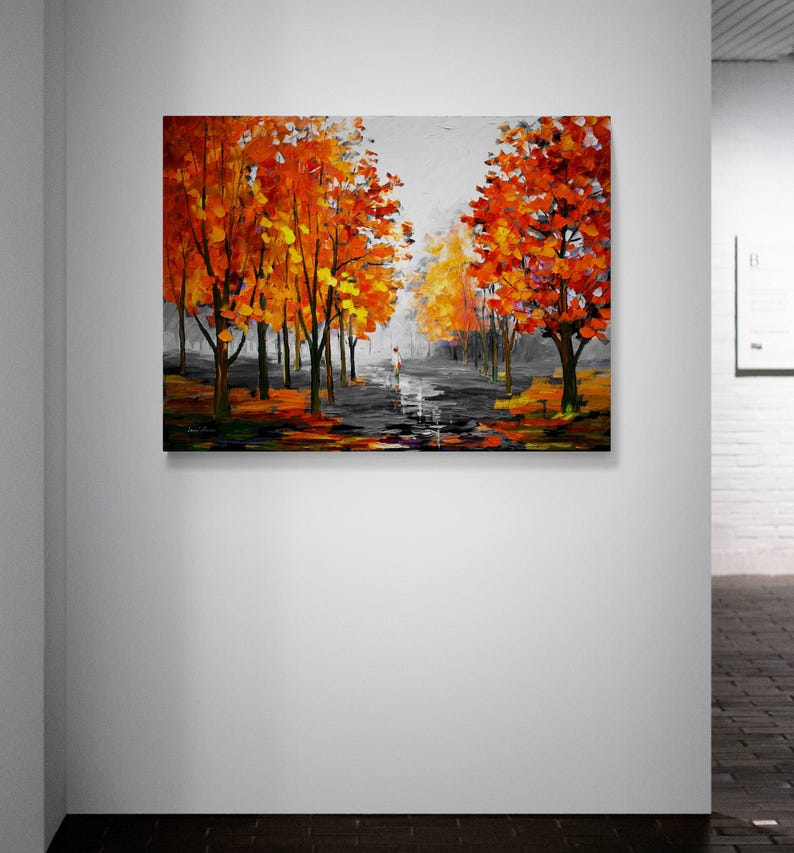 May include: An oil painting depicts a park scene with vibrant orange and yellow trees lining a path. A figure walks along the path, which reflects the sky. The artwork is dominated by warm colors, creating a sense of autumn.