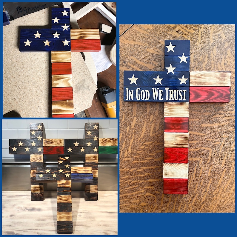 K&ouml;nnte beinhalten: Ein Holzkreuz mit dem Design der amerikanischen Flagge, mit den Worten "In God We Trust" auf dem horizontalen Balken. Das Kreuz besteht aus mehreren Holzst&uuml;cken, die jeweils mit den Farben der amerikanischen Flagge bemalt sind. Das Kreuz ist ein patriotisches und religi&ouml;ses Symbol.