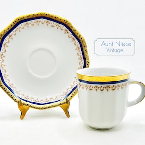 Vintage espresso cup or demitasse Tirschenreuth Bavaria heavy gold rim with navy blue and brown ornate design on white cup saucer c.1950s