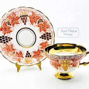 Vintage Teacup Saucer Rosina China Orange Red Gold Grapes leaves gold rim pedestal cup and saucer c. 1940s
