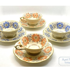 Mix and Match Vintage Demitasse Schwarzenhammer Bavaria orange daisies and blue daisies vintage espresso cups and saucers c. 1950s