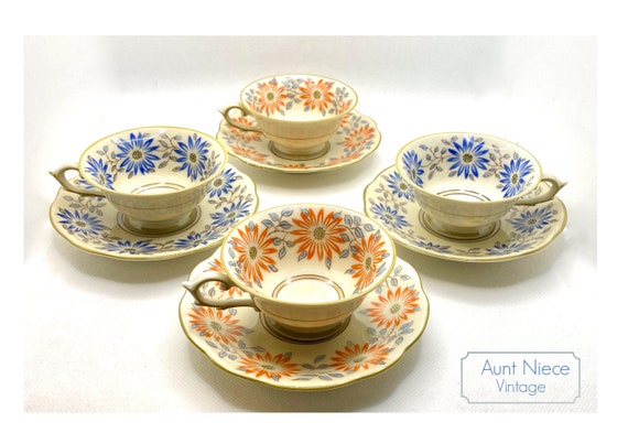 Mix and Match Vintage Demitasse Schwarzenhammer Bavaria orange daisies and blue daisies vintage espresso cups and saucers c. 1950s