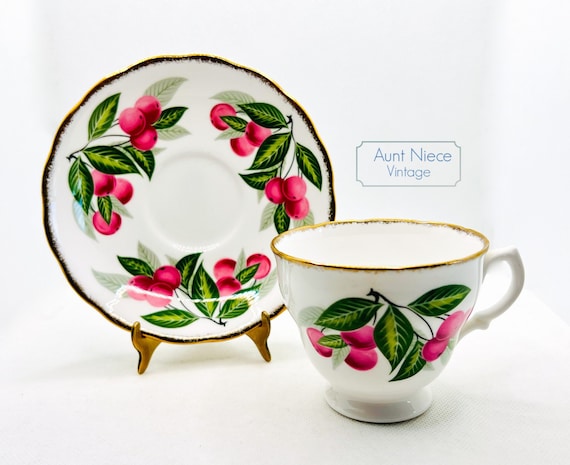 Vintage teacup and saucer Royal Malvern Cherry and green leaves with heavy gold accents c.1950