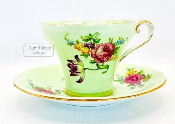 Vintage Teacup and Saucer Aynsley Bone China teacup mint green corset cup with roses, purple and yellow flowers and saucer gold accents