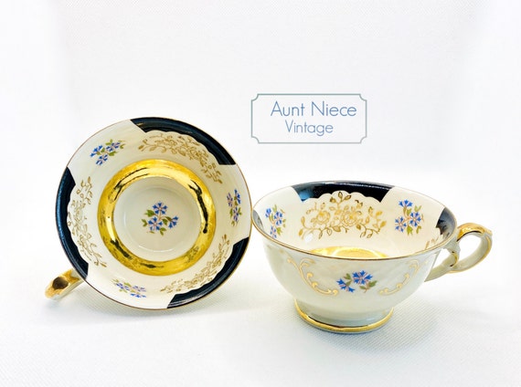 Vintage demitasse teacup set Winterling Bavaria set of 2 black and gold with blue floral vintage espresso cups  c. 1960s