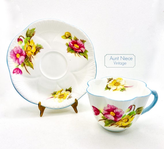 1960s Vintage Shelley teacup and saucer Begonia pattern dainty shape and blue handle