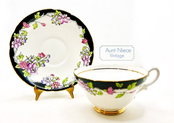Vintage teacup and saucer Stanley bone china brown wide mouth pedestal cup with yellow pink and purple flowers gold accent c. 1950s