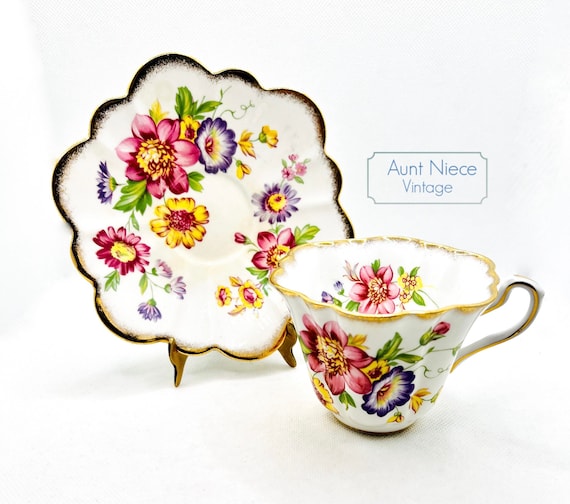 Vintage Teacup and Saucer Rosina Bone China pink, purple and yellow flowers gold scalloped edge teacup and saucer c. 1950s