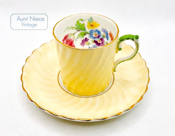 Vintage demitasse or espresso cup and saucer Aynsley china yellow scalloped texture with flowers c. 1950s
