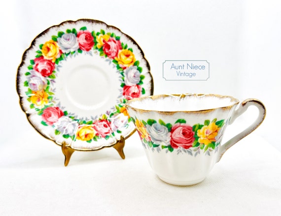 Vintage Teacup and Saucer Gladstone Bone China "Rosemary" blue roses yellow roses pink roses heavy gold scalloped edge c.1950s
