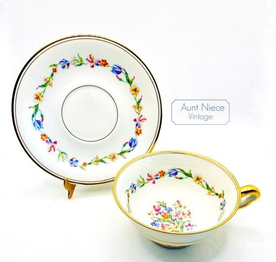 Vintage teacup and saucer Limoges Raynaud Co Gimbel Brothers Floral Wreath and Gold, footed cup and saucer c.1930s