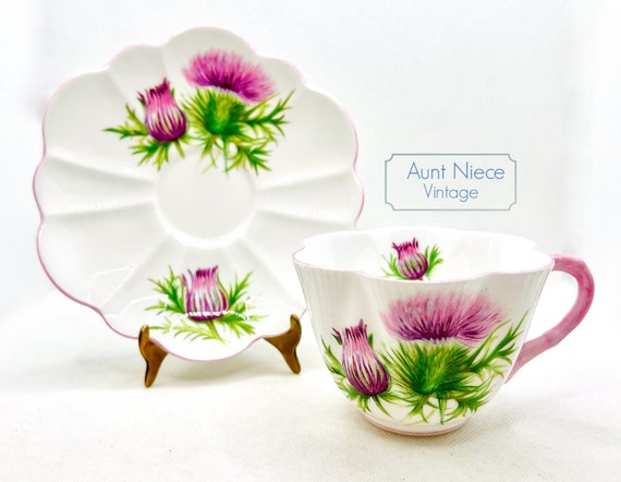 Vintage teacup and saucer Shelley Bone China Thistle pink purple thistle and green small dainty shape 13820 c.1950s