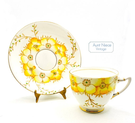 Vintage Teacup and saucer Rosalyn China Esme Yellow flowers deco gold gilt hand-painted green pistils vintage Rosalyn c.1950s