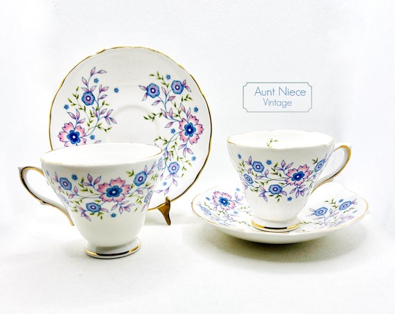 Vintage teacup and saucer 2 Avon Blue Blossom Cups and Saucers purple blue pink floral 1970s fine bone china c.1974