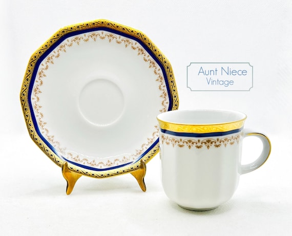 Vintage espresso cup or demitasse Tirschenreuth Bavaria heavy gold rim with navy blue and brown ornate design on white cup saucer c.1950s