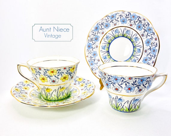 Set of 2 Vintage Rosina Bone China Teacups and Saucers Blue flower chintz and Yellow flower chintz c. 1940s