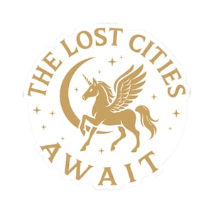 May include: A circular sticker featuring a gold unicorn with wings, a crescent moon, and stars. The text reads "THE LOST CITIES AWAIT" in gold. The sticker is set against a white backdrop.