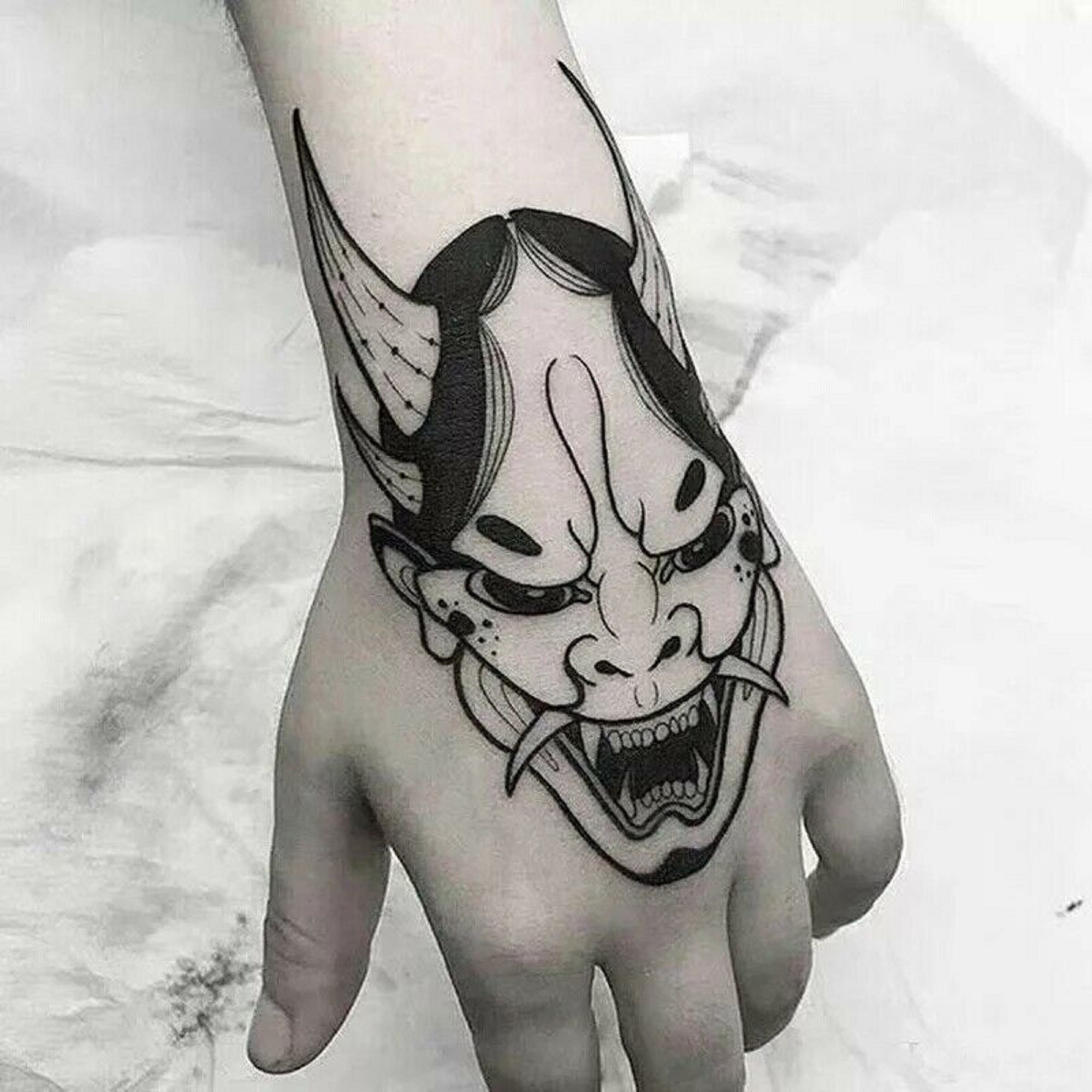 Skull and Anchor Hand Tattoo