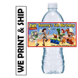May include: A clear plastic water bottle with a custom label featuring characters from the Toy Story film. The label reads "Toy Tommy's 5th Birthday" with the date "Oct. 17, 2027". The words "We Print & Ship" are printed on the side.