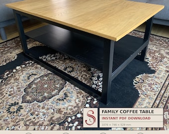 May include: A rectangular coffee table with a light brown wood grain top and a black frame featuring a lower shelf. The text reads: FAMILY COFFEE TABLE, INSTANT PDF DOWNLOAD, 1076 x 746 x 529 mm, BEGINNER FRIENDLY, METRIC PLANS, POCKET HOLE JOINERY, STEP BY STEP DRAWINGS.