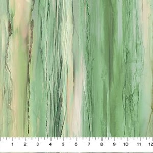 May include: Abstract fabric with vertical streaks in shades of green, beige, and brown. A ruler is placed along the bottom edge, showing measurements in inches. The fabric has a watercolor-like appearance.