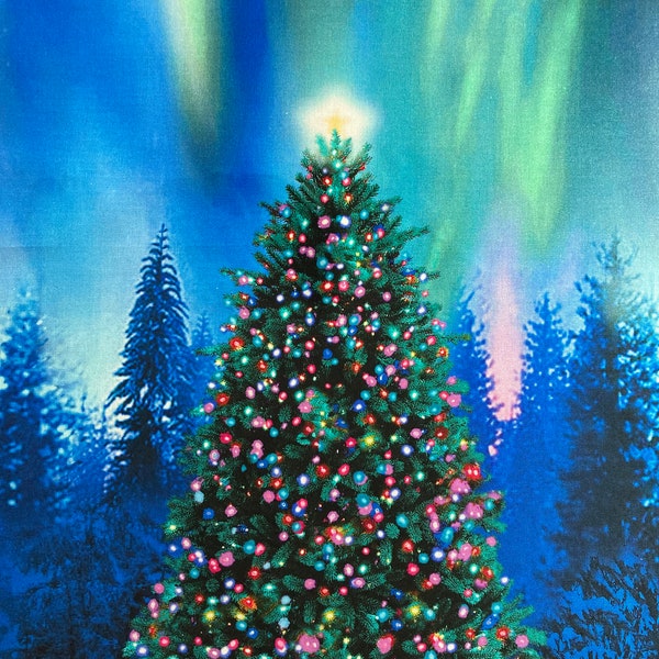 Christmas Tree Quilting Panel Against Aurora Borealis Blue Forest and Sky From Timeless Treasures