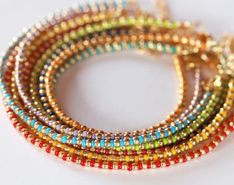Pulsera delicada de cuentas de semillas de oro / SBB-19