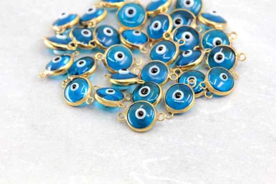 Amuletos de cristal azul turquesa contra el mal de ojo, cuentas redondas de  color dorado Nazar 8 mm x 12 mm 5 piezas -  México