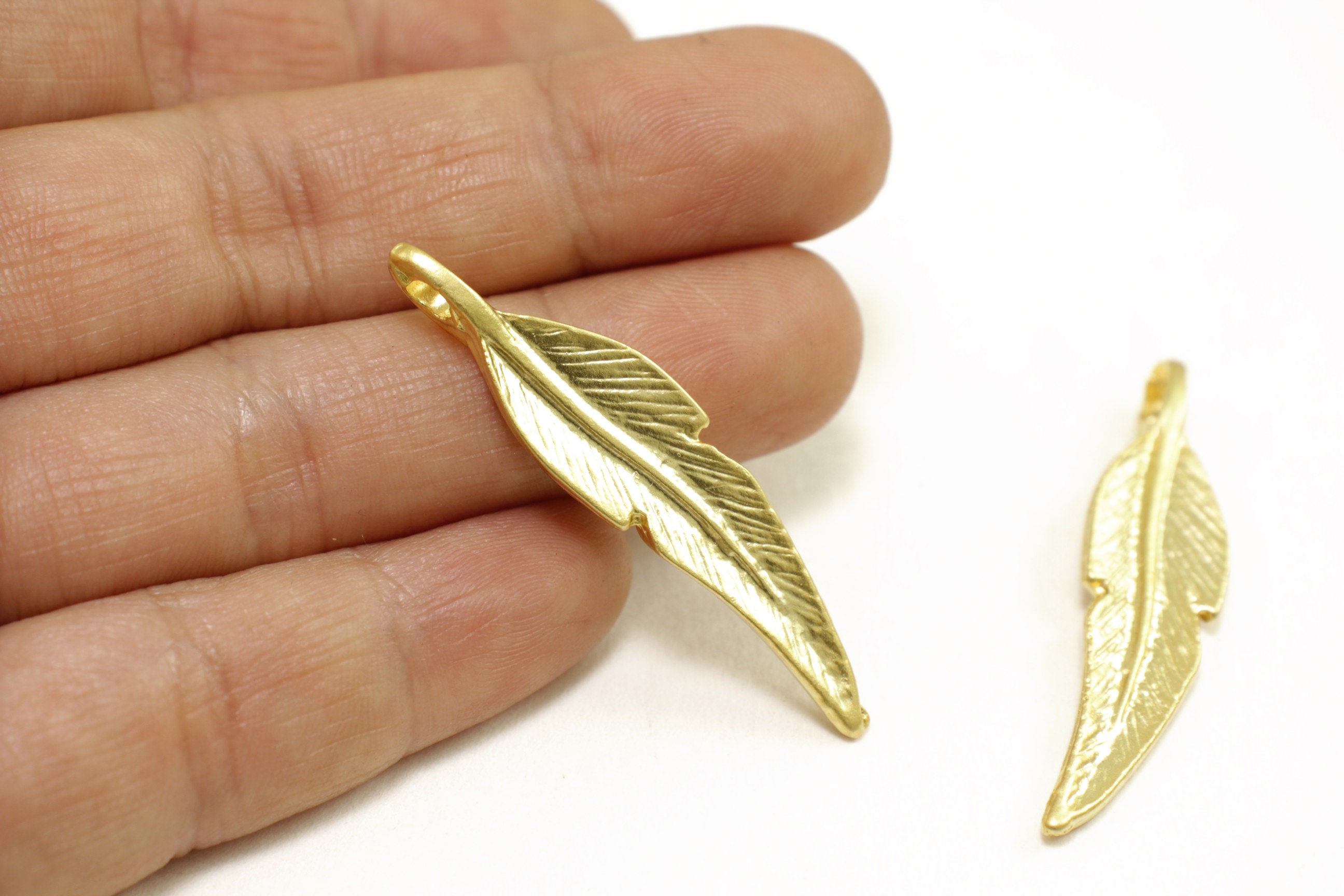 42mm Feather Pendants, Matte/shiny Gold Plated Metal 42mm Feather Pendants, Matte/shiny Gold Plated Metal