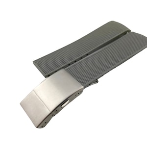 May include: A gray silicone watch band with a silver buckle. The band has a textured surface.