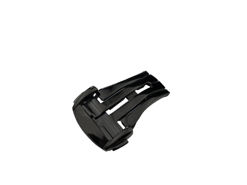 May include: Black metal watch band buckle with a polished finish.